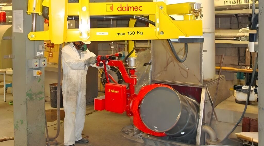 Dalmec pneumatic manipulator used for manual handling in food manufacturing.]