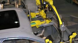 Industrial automotive roof panel lifting manipulator used for precise, safe, and ergonomic handling of vehicle body panels during automotive manufacturing
