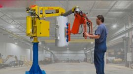 Dalmec pneumatic manipulator lifting a hydraulic cylinder for safe, ergonomic handling during mining equipment maintenance."