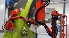 Dalmec manipulator handling heavy maintenance equipment for safe lifting and positioning in mining facilities.