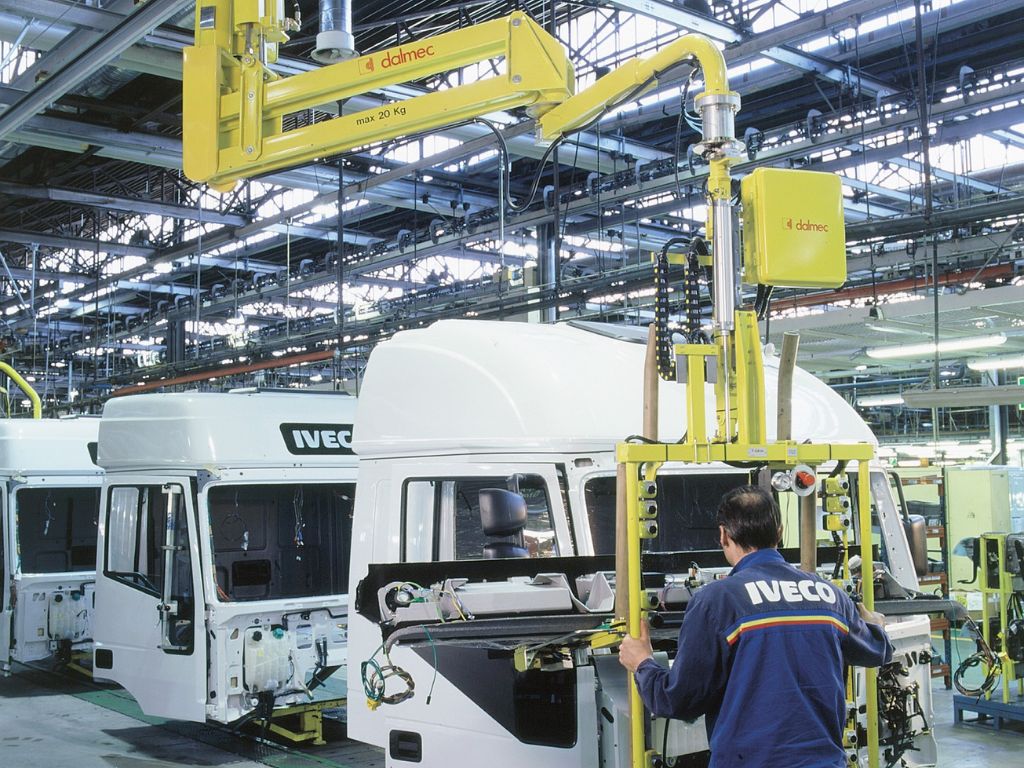 : Dalmec pneumatic manipulator on Australian manufacturing production line, operator guiding component one-handed