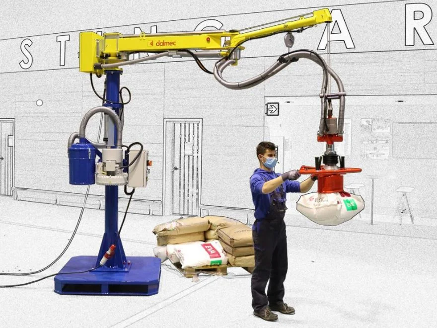 Dalmec Posifil Bags vacuum manipulator with electric turbine and suction cup tool handling a cement bag on a portable baseplate in an industrial facility
