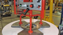 Dalmec industrial manipulator handling composite aerospace structures with precision and ergonomic control.