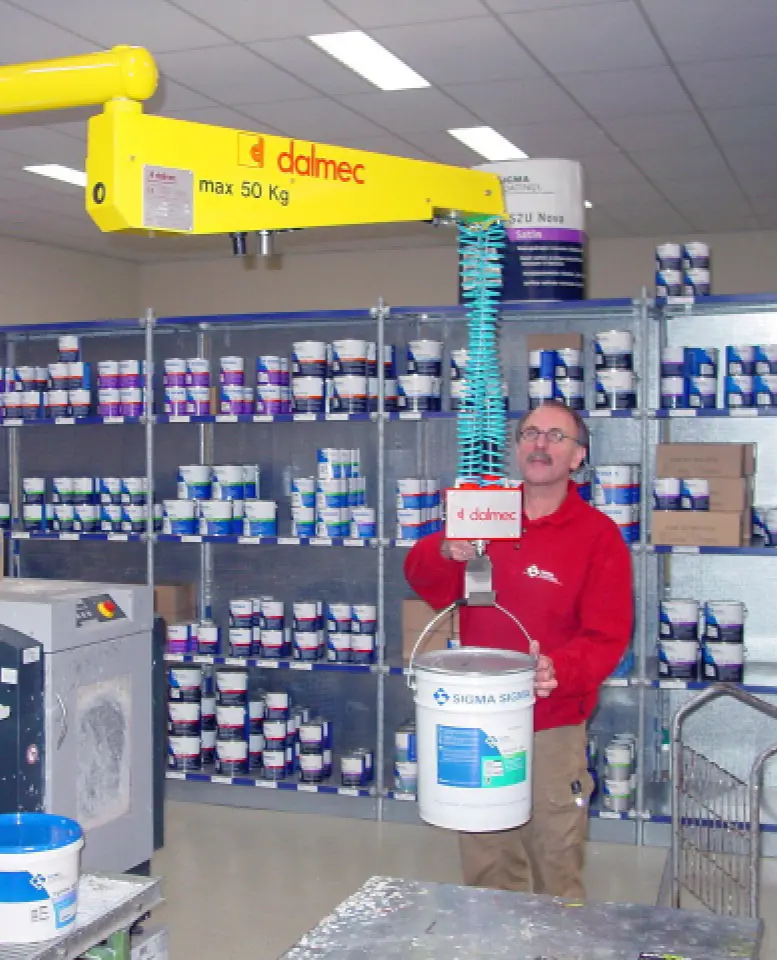 Dalmec custom lifting solution transporting coating materials safely in manufacturing facilities.