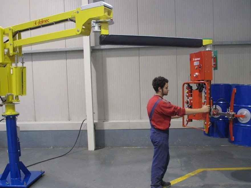 Dalmec drum positioning manipulator for ergonomic material handling.