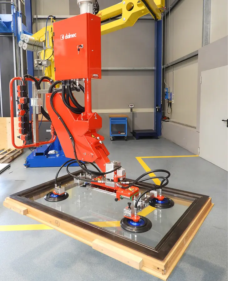 Dalmec custom lifting system positioning glazed doors accurately during production.