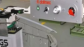 Dalmec vacuum manipulator handling MDF boards for safe lifting and accurate positioning in a woodworking facility.